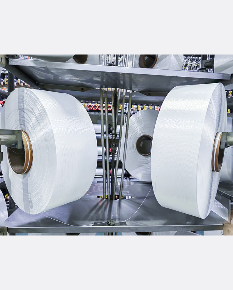 Mi a szerepe az újrahasznosított FDY fonalnak a textilhulladék csökkentésében?